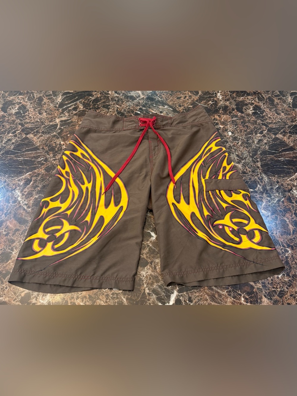 Vintage Men's Brown Board Shorts with Yellow Flame Graphic
